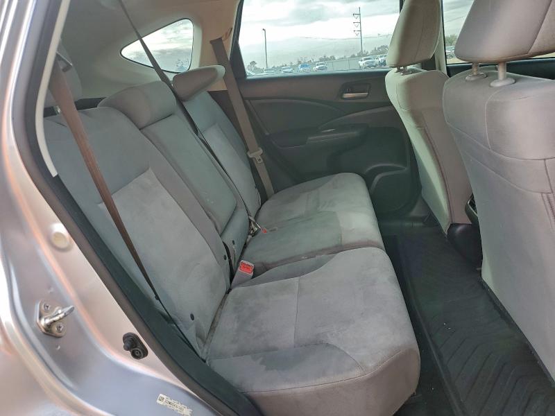 Photo 11 from auction – 2015 HONDA CR-V with VIN 3CZRM3H34FG714031