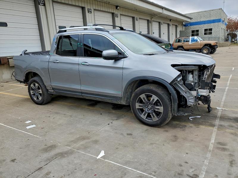 Photo 4 from auction – 2018 HONDA RIDGELINE with VIN 5FPYK3F56JB014514