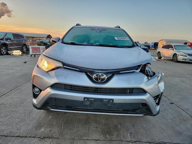 Photo 5 from auction – 2017 TOYOTA RAV4 XLE with VIN 2T3WFREV4HW369906