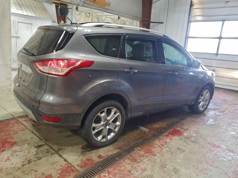 Photo 3 from auction – 2014 FORD ESCAPE TIT with VIN 1FMCU9J90EUB41858