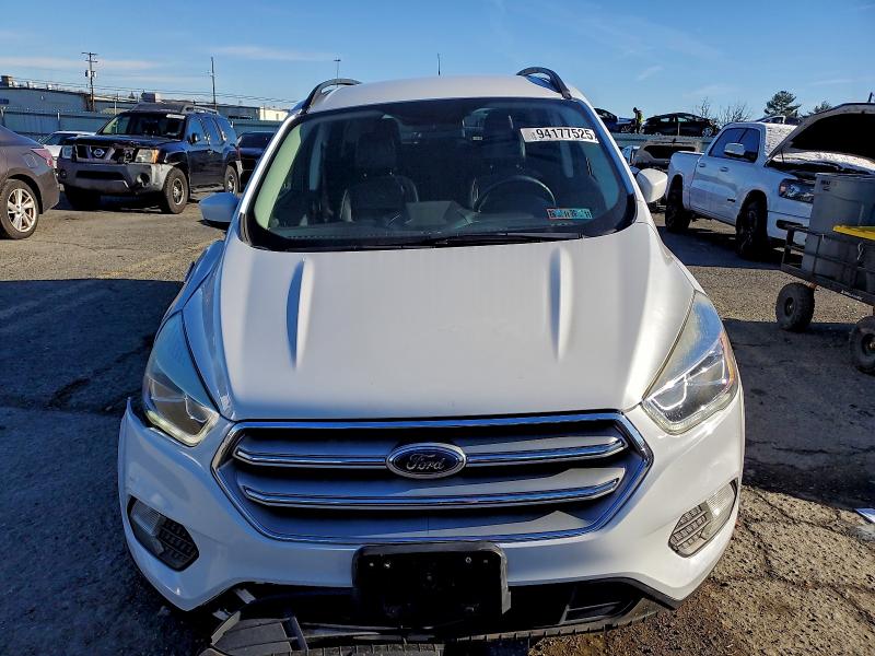 Photo 5 from auction – 2017 FORD ESCAPE with VIN 1FMCU9GD0HUD99300