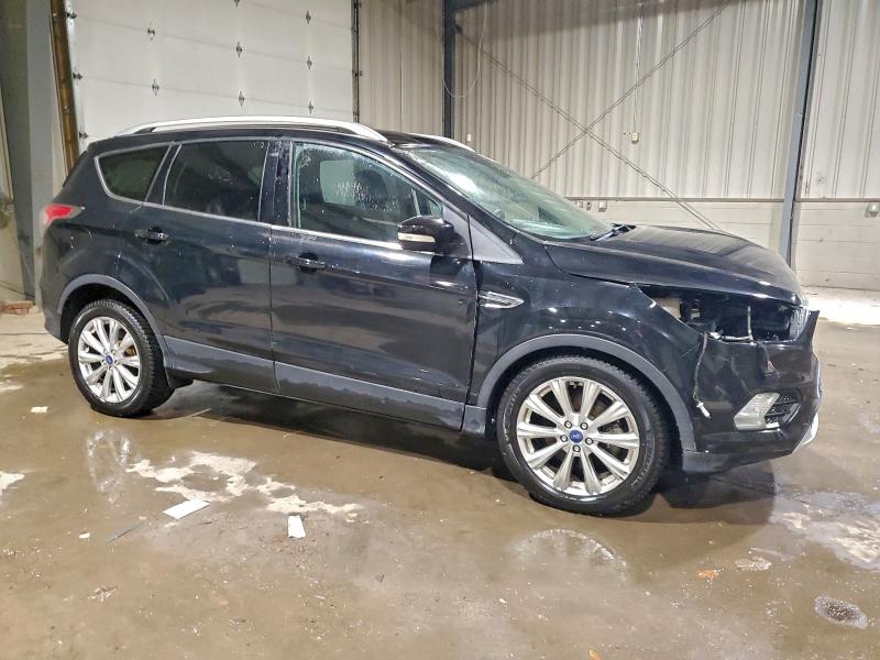 Photo 4 from auction – 2017 FORD ESCAPE TIT with VIN 1FMCU9J97HUA95871