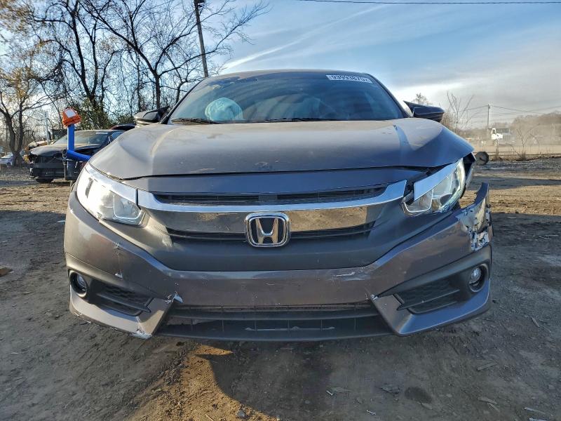 Photo 5 from auction – 2016 HONDA CIVIC EX with VIN 2HGFC3B32GH355320