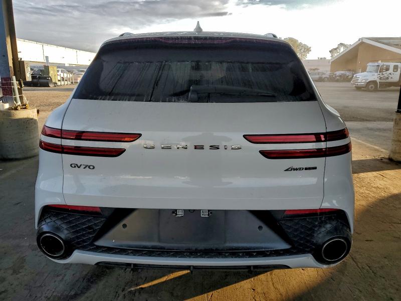 Photo 6 from auction – 2022 GENESIS GV70 BASE with VIN KMUMCDTC1NU012757