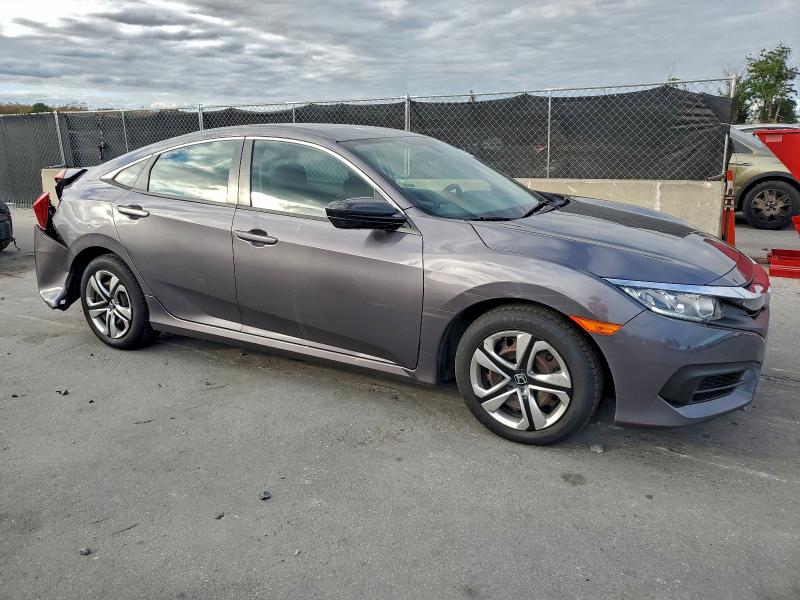 Photo 4 from auction – 2018 HONDA CIVIC LX with VIN 19XFC2F5XJE014142