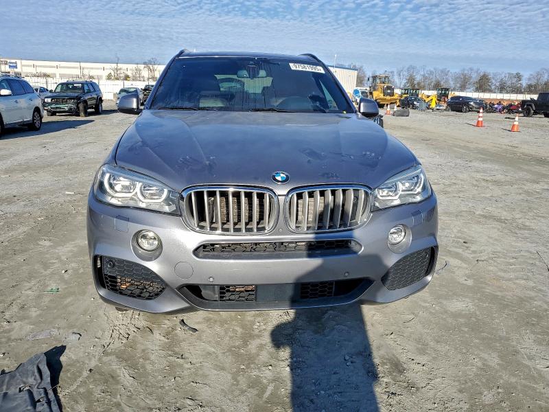 Photo 5 from auction – 2016 BMW X5 XDRIVE5 with VIN 5UXKR6C56G0J81428