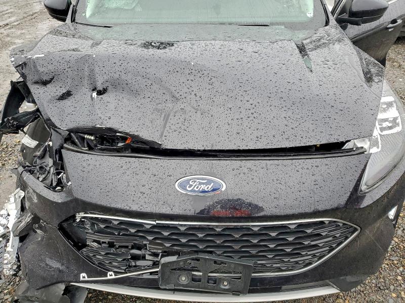 Photo 11 from auction – 2021 FORD ESCAPE TIT with VIN 1FMCU9J97MUA55820