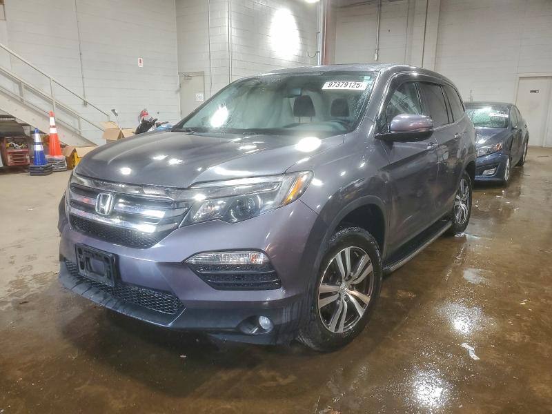 HONDA PILOT EXL 2018 with VIN 5FNYF6H55JB067071 - Photo from auction