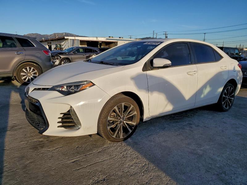 TOYOTA COROLLA L 2017 with VIN 5YFBURHE6HP665097 - Photo from auction