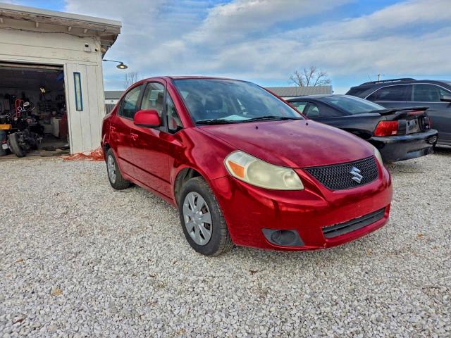 SUZUKI SX4 LE 2012 with VIN JS2YC5A34C6300311 - Photo from auction