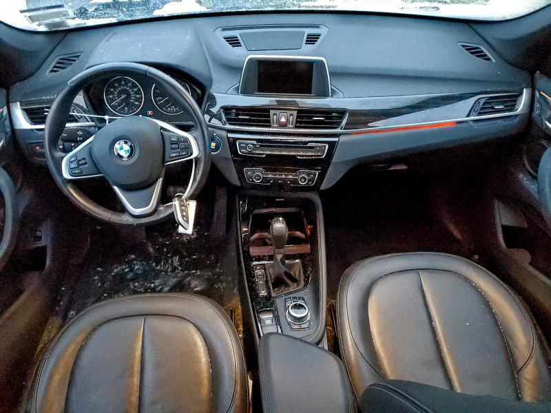 Photo 8 from auction – 2016 BMW X1 with VIN WBXHT3Z35G4A50359