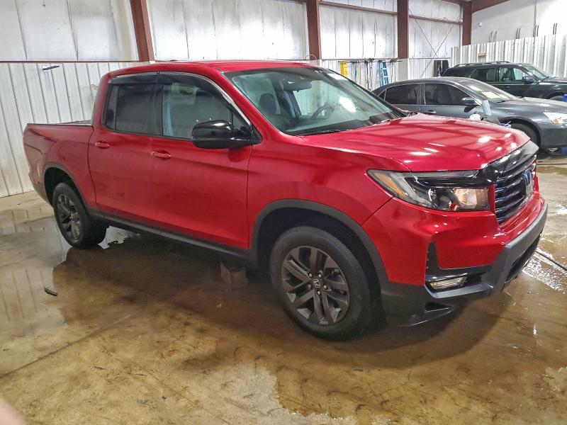 Photo 4 from auction – 2022 HONDA RIDGELINE with VIN 5FPYK3F12NB005585