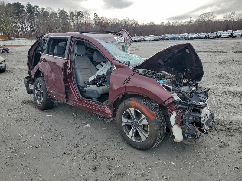 Photo 4 from auction – 2017 HONDA CR-V LX with VIN 7FARW5H30HE008733