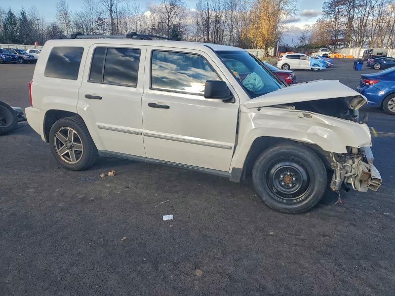 Photo 4 from auction – 2009 JEEP PATRIOT LI with VIN 1J8FF48B49D215563