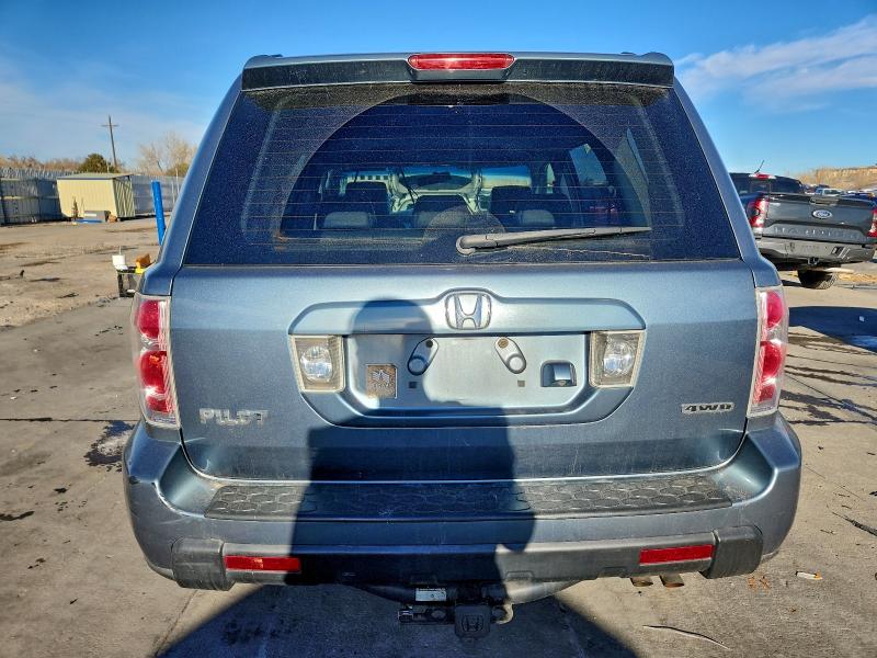 Photo 6 from auction – 2006 HONDA PILOT EX with VIN 2HKYF18756H525897