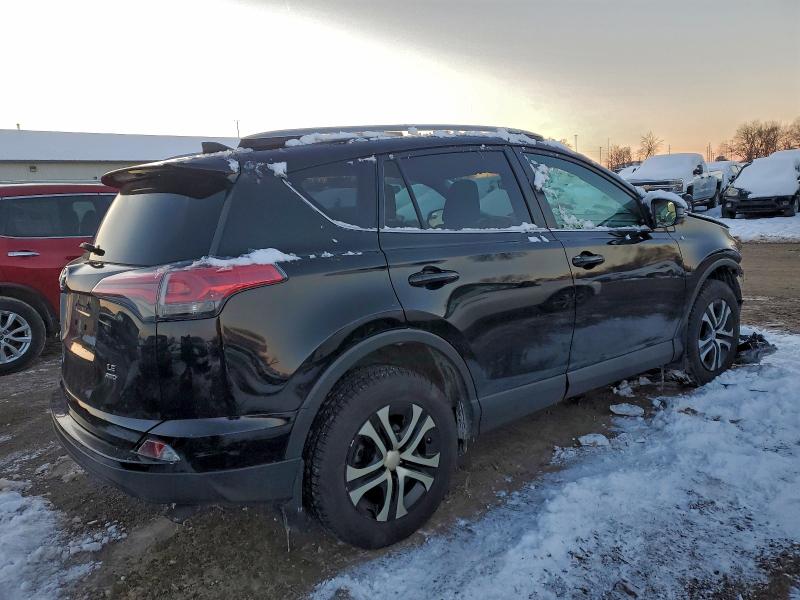 Photo 3 from auction – 2018 TOYOTA RAV4 LE with VIN 2T3BFREV0JW807714