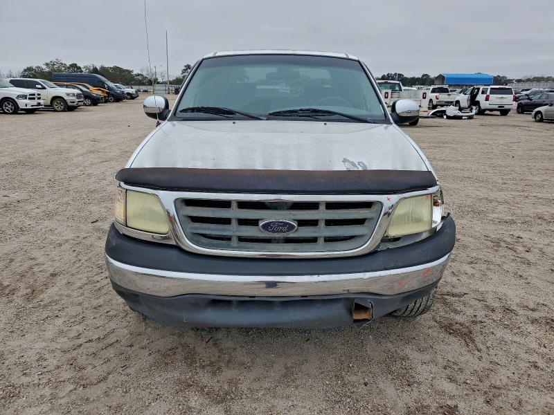 Photo 5 from auction – 2002 FORD F150 SUPER with VIN 1FTRW07652KA19943