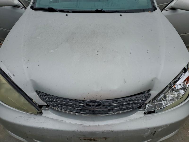 Photo 11 from auction – 2004 TOYOTA CAMRY LE with VIN 4T1BF30K54U064281