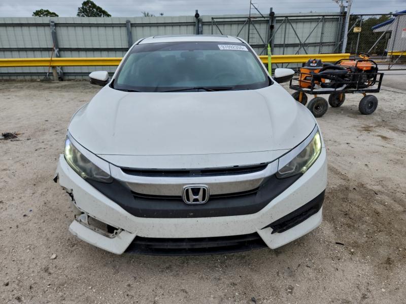 Photo 5 from auction – 2018 HONDA CIVIC with VIN 19XFC2F71JE032188