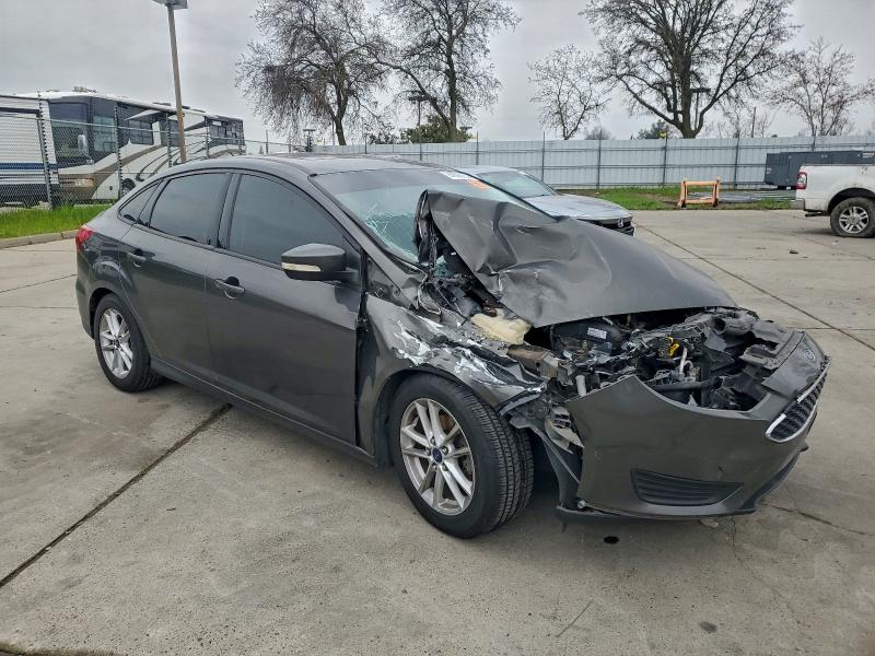Photo 4 from auction – 2015 FORD FOCUS SE with VIN 1FADP3F20FL286579