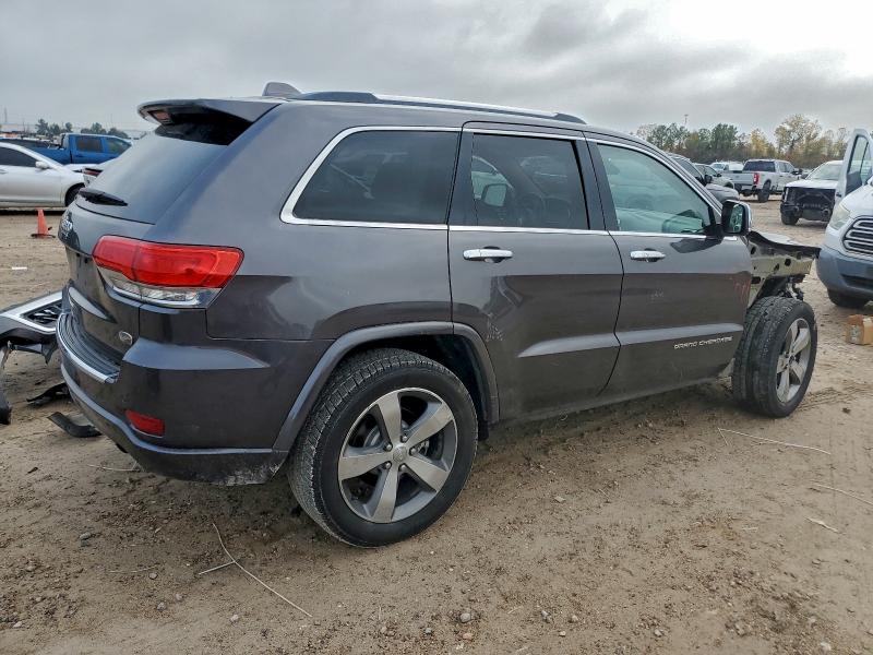Photo 3 from auction – 2014 JEEP GRAND CHER with VIN 1C4RJECG9EC523663