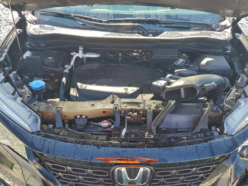 Photo 12 from auction – 2021 HONDA PASSPORT E with VIN 5FNYF7H50MB002008
