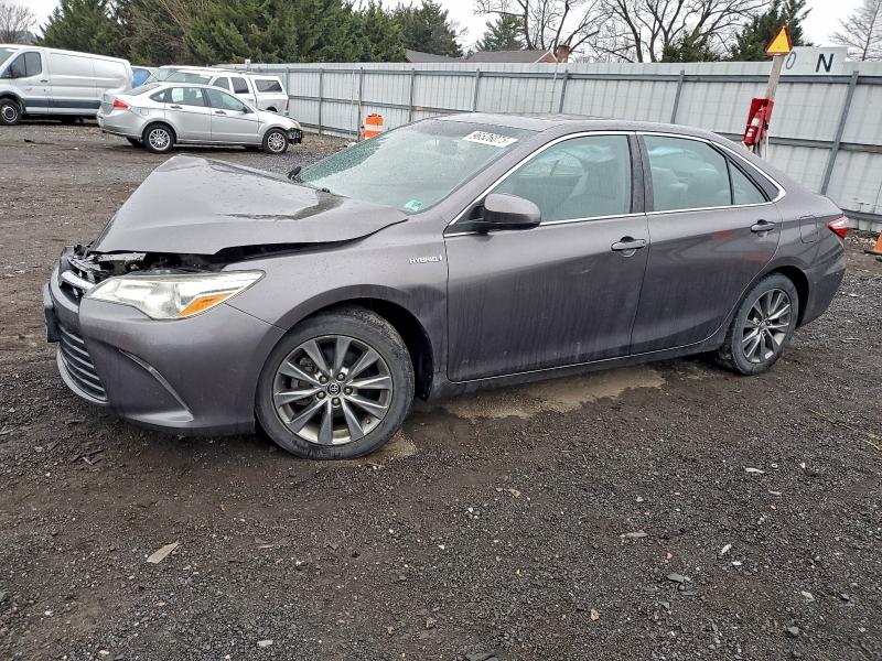 TOYOTA CAMRY HYBR 2015 with VIN 4T1BD1FK5FU145950 - Photo from auction