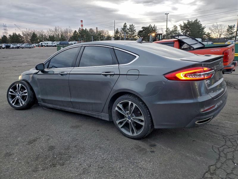 Photo 2 from auction – 2020 FORD FUSION TIT with VIN 3FA6P0D91LR153172