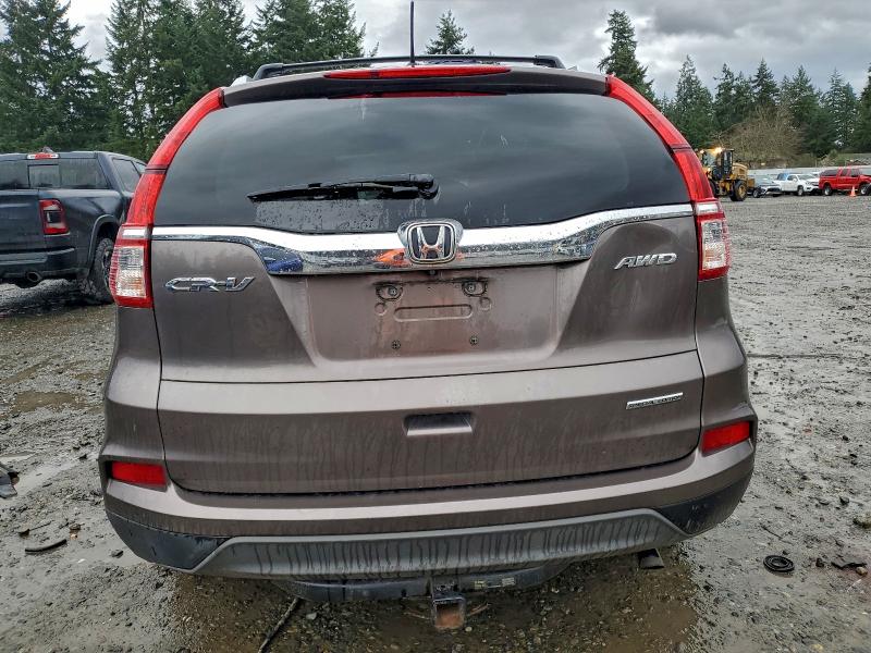 Photo 6 from auction – 2016 HONDA CR-V SE with VIN 2HKRM4H46GH662611