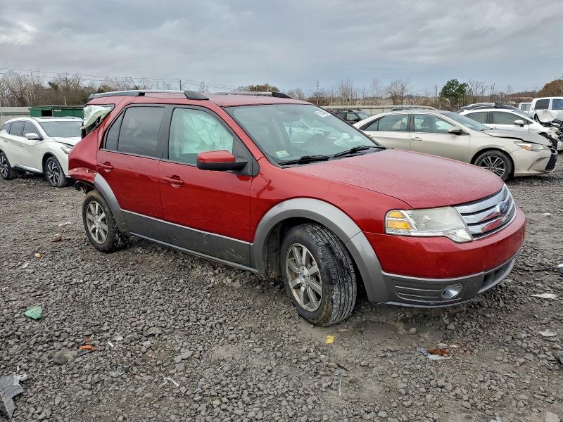 Photo 4 from auction – 2009 FORD TAURUS X S with VIN 1FMDK02W69GA02462