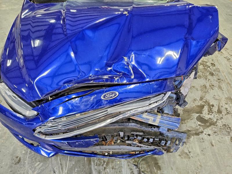 Photo 11 from auction – 2016 FORD FUSION SE with VIN 3FA6P0H74GR359407