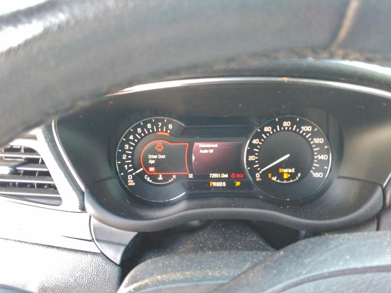 Photo 9 from auction – 2015 LINCOLN MKC with VIN 5LMCJ2A92FUJ47627