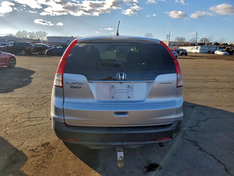 Photo 6 from auction – 2014 HONDA CR-V LX with VIN 2HKRM4H33EH671707