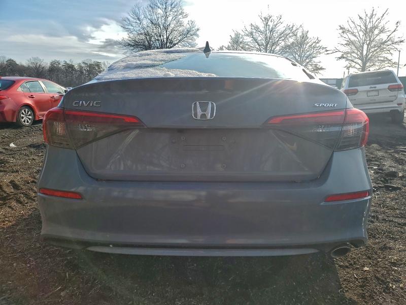 Photo 6 from auction – 2022 HONDA CIVIC SPOR with VIN 2HGFE2F55NH544802