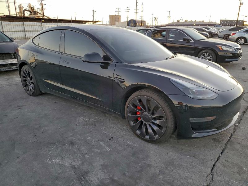 Photo 4 from auction – 2023 TESLA MODEL 3 with VIN 5YJ3E1EC1PF713797