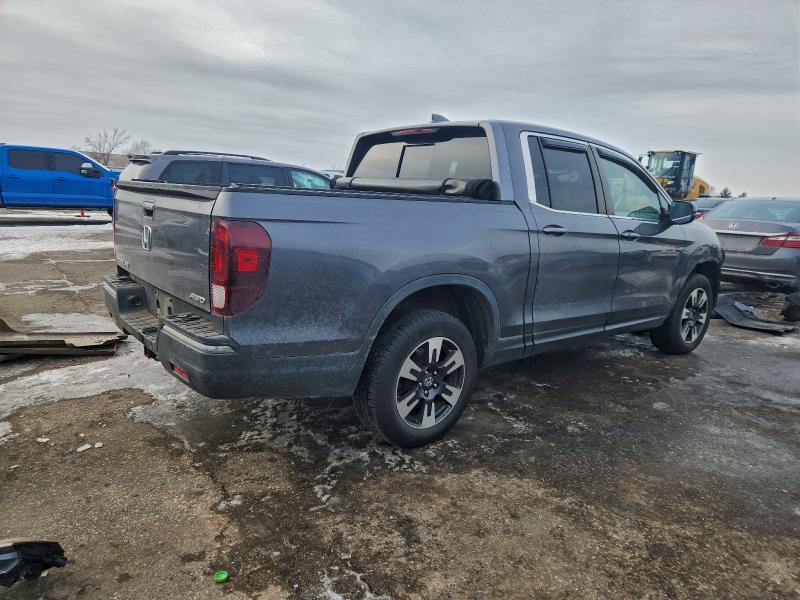 Photo 3 from auction – 2019 HONDA RIDGELINE with VIN 5FPYK3F58KB000521
