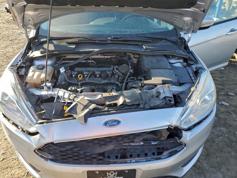 Photo 11 from auction – 2016 FORD FOCUS SE with VIN 1FADP3F25GL321991