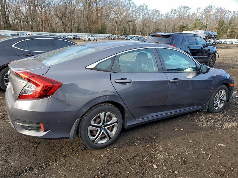 Photo 3 from auction – 2016 HONDA CIVIC LX with VIN 2HGFC2F51GH555448