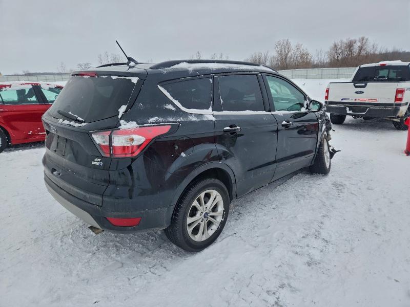 Photo 3 from auction – 2018 FORD ESCAPE SE with VIN 1FMCU9GDXJUA96563