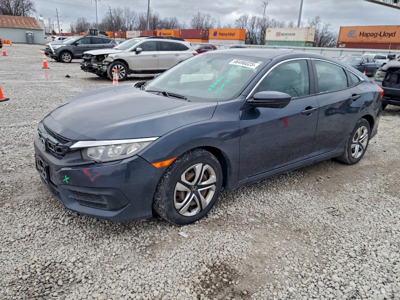Photo 1 from auction – 2018 HONDA CIVIC LX with VIN 19XFC2F53JE007470