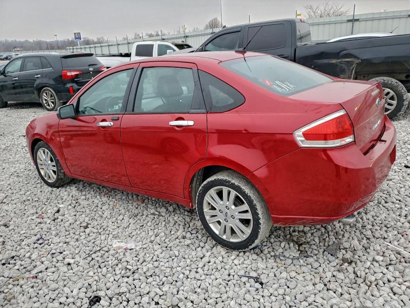 Photo 2 from auction – 2010 FORD FOCUS with VIN 1FAHP3HNXAW141954