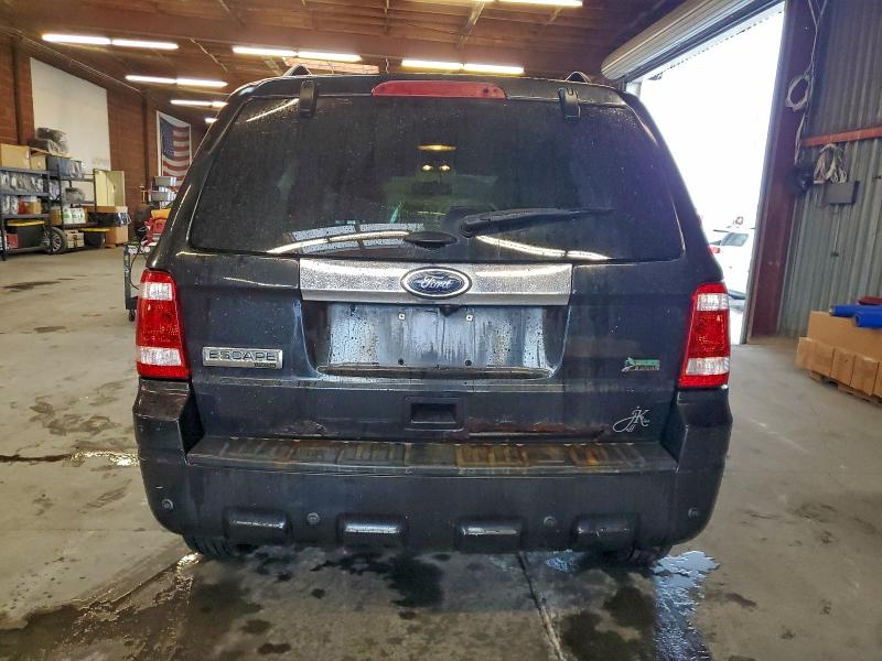 Photo 6 from auction – 2011 FORD ESCAPE LIM with VIN 1FMCU9EG4BKB69548