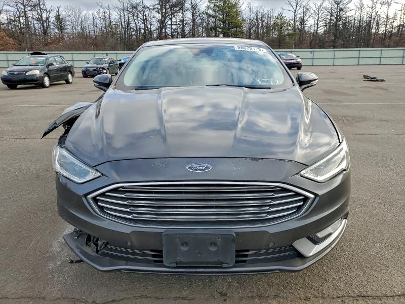 Photo 5 from auction – 2017 FORD FUSION TIT with VIN 3FA6P0SU0HR105161