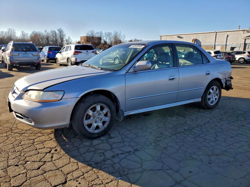 HONDA ACCORD EX 2002 with VIN 1HGCG66812A127055 - Photo from auction