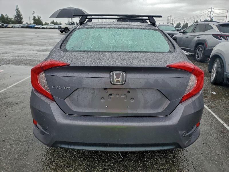 Photo 6 from auction – 2018 HONDA CIVIC LX with VIN 19XFC2E53JE037764