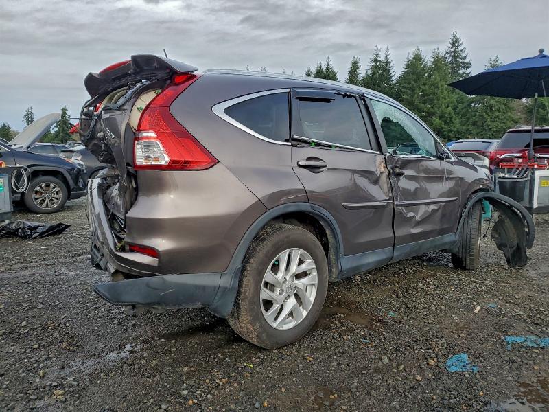 Photo 3 from auction – 2015 HONDA CR-V EXL with VIN 2HKRM4H75FH669395