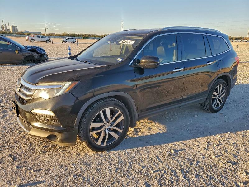 Photo 1 from auction – 2017 HONDA PILOT TOUR with VIN 5FNYF6H9XHB085885