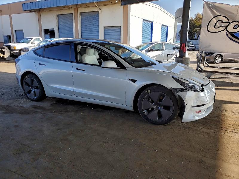 Photo 4 from auction – 2022 TESLA MODEL 3 with VIN 5YJ3E1EB7NF127948