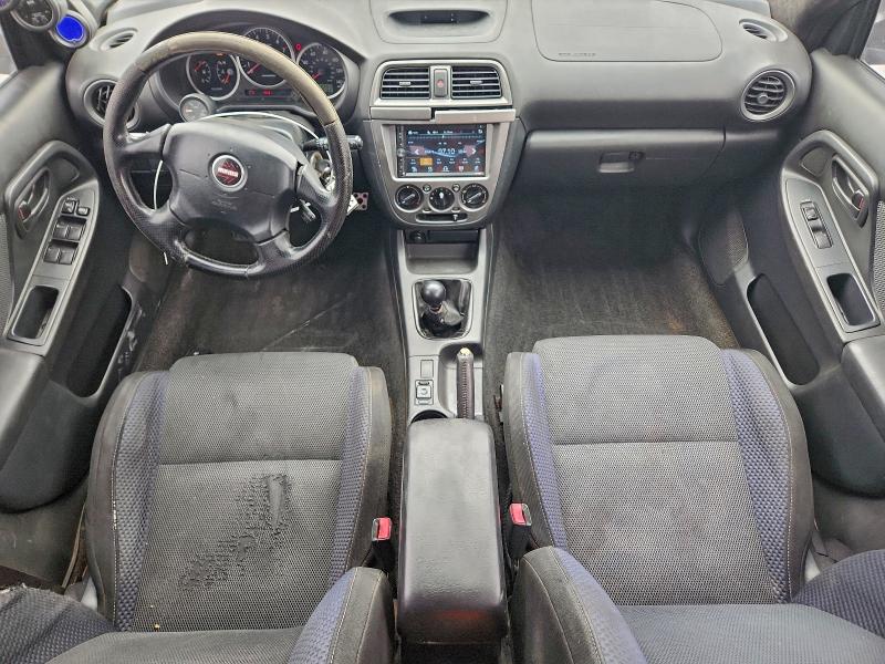 Photo 8 from auction – 2004 SUBARU IMPREZA with VIN JF1GG29654G812328