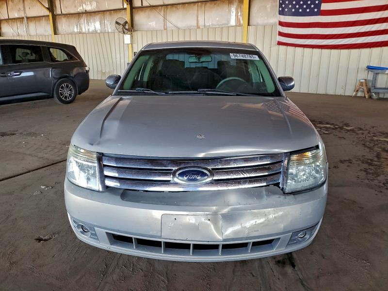 Photo 5 from auction – 2009 FORD TAURUS LIM with VIN 1FAHP25W79G123957